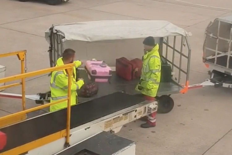 Shocking footage shows reckless baggage handler hurl cases from flight