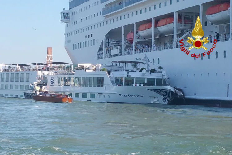 MSC ship crashes into dock and strikes Uniworld river ship in Venice