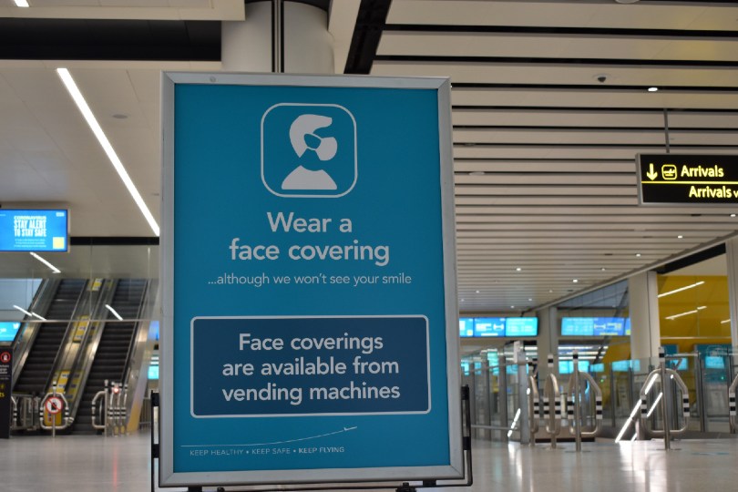 Face coverings to remain mandatory at airports and onboard aircraft