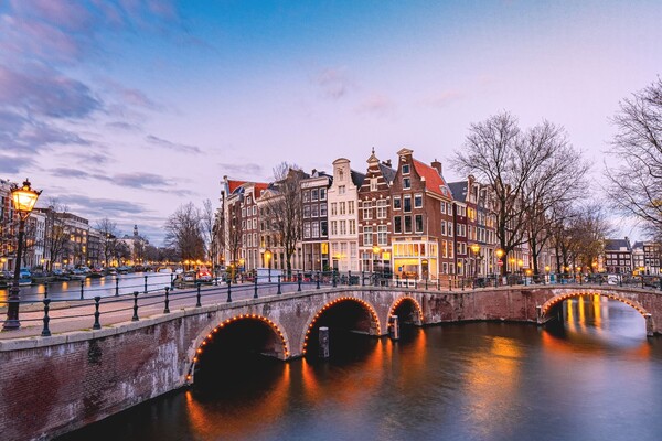 Amsterdam to cut river cruise calls to keep city ‘liveable’