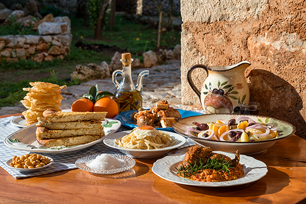 Enjoy an authentic Greek cooking lesson with a leading Aldemar resorts chef