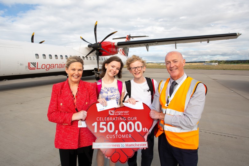 Loganair awards 150,000th Inverness-Manchester passenger free flight