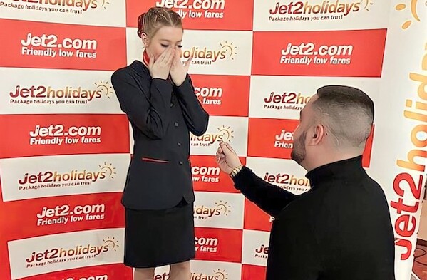 'Hold my hand... in marriage?' Jet2 cabin crew's surprise proposal