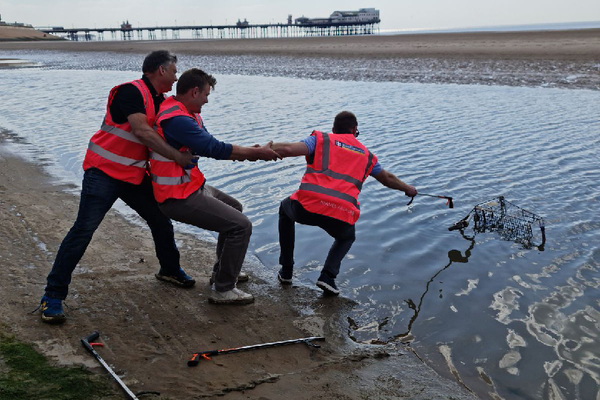 Travel Village and Royal Caribbean pick 50kg of rubbish from Blackpool beach