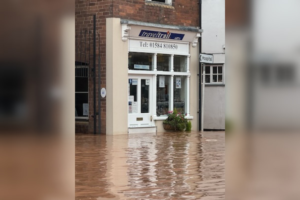 Storm Bert: 'We're a little soggy but we're here to stay', says travel agency boss